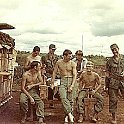 "Boyz'n da hood" - Fr Row - Mark Hollenbeck, Bill Biggs, Scott Krueger and Lt. Ken Kotiza.  Bk Row - Joe Tomlinson, Lt. Mike Rivers and Larry Cutter. Relaxing around the picnic table at Bu Dop circa latter half 1970.
